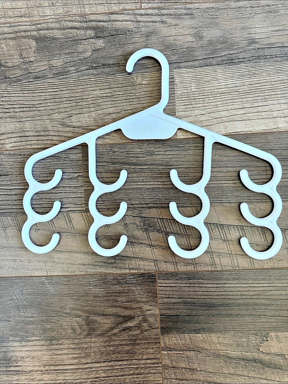 Hang-a-bunch tank top hanger
